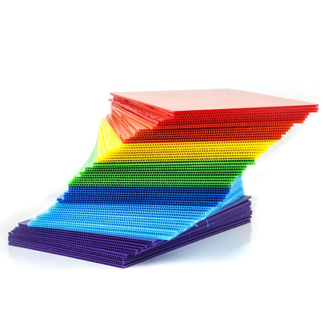 Variety of stacked plastic square sheets stacked colored plastic sheets